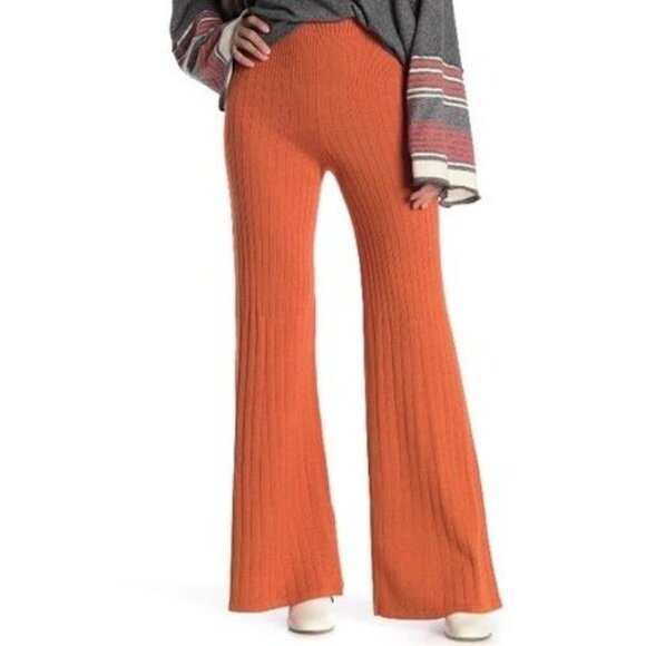 Free People Keep It Real Flare High Waist Ribbed Knit Sweater Pants In Mango - Picture 1 of 12